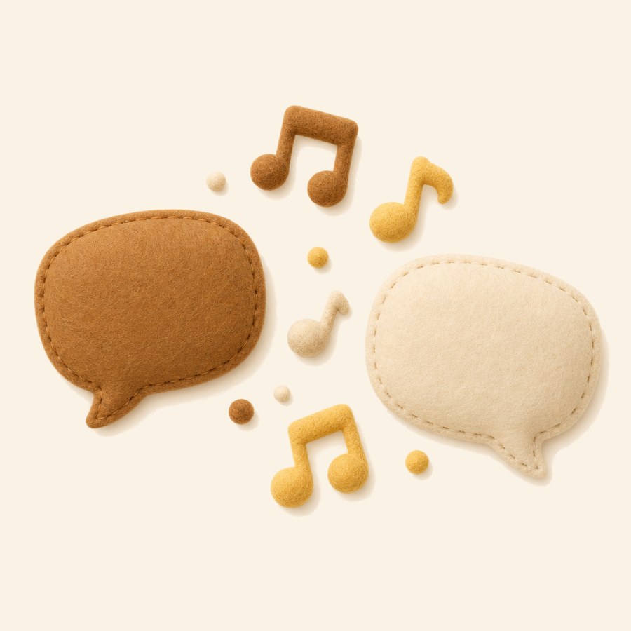 Globos de diálogo en dos idiomas con notas musicales de fieltro